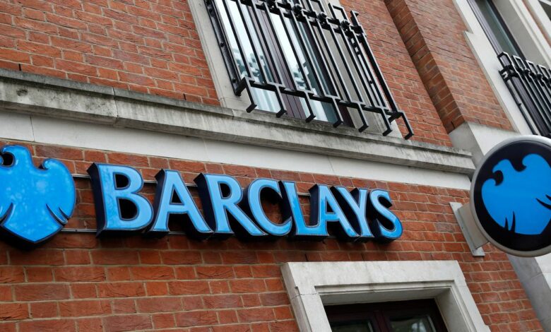 A branch of Barclays Bank is seen, in London
