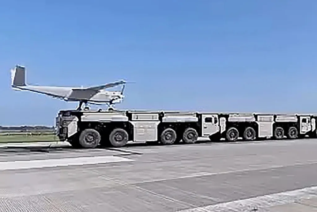Çin hərbi hava qüvvələrini gizlətmək üçün mülki yük maşınlarını dron buraxıcılarına çevirir